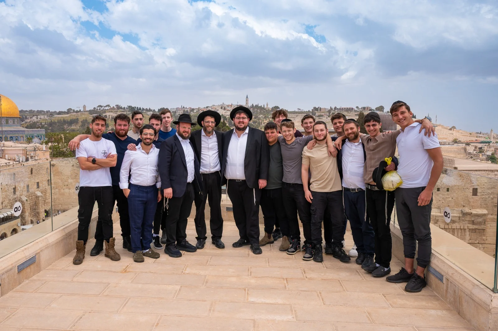 A group together on a Jerusalem rooftop